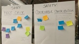 Two posters with post-it notes about safety root causes and conceivable contributions.